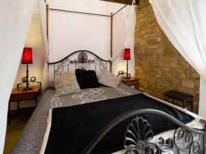 Postel nebo postele na pokoji v ubytování La Pata de Oca Hostal Rural y Albergue