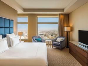 Postel nebo postele na pokoji v ubytování Swissôtel Al Ghurair Dubai - Deira & Creek