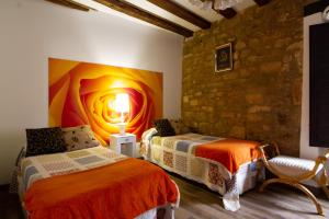 Postel nebo postele na pokoji v ubytování La Pata de Oca Hostal Rural y Albergue