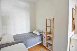 Säng eller sängar i ett rum på HOMELY - City Apartment 50m2