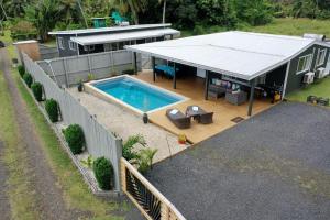 an overhead view of a house with a swimming pool at Te Etu Villa 2 in Rarotonga