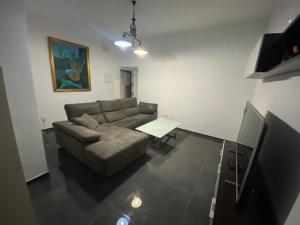 A seating area at CASA REFORMADA CON TERRAZA/WIFI/AIRE ACONDICIONADO