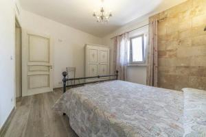 Postel nebo postele na pokoji v ubytování Villa Salux by HDSalento