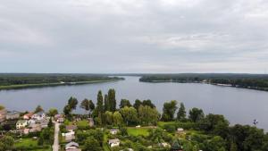 an island in the middle of a lake at Pension und Ferienwohnung Walther App. 2 in Storkow