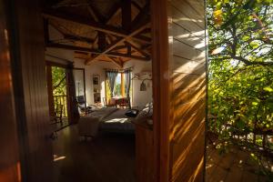 a bedroom in a house with a bed in a room at Guarda Che Luna in Sasso di Castalda