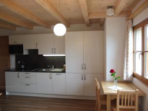 Kuchyň nebo kuchyňský kout v ubytování Haus Schlernblick + 37 fotografií