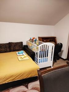 Postel nebo postele na pokoji v ubytování Apartman Vukan