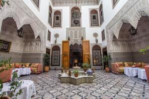 Posezení v ubytování Riad Pacha Palace