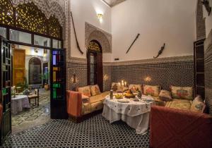 Posezení v ubytování Riad Pacha Palace