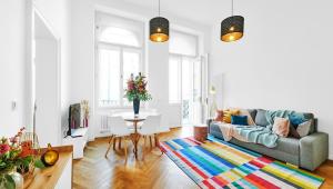 a living room with a couch and a table at Residence Dlouha - Old Town in Prague