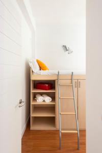 A bed or beds in a room at Alohamundi Triana
