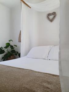 Postel nebo postele na pokoji v ubytování Une Nuit à Bali - Appartement cocooning