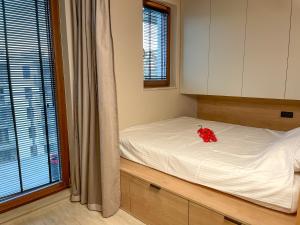 Posteľ alebo postele v izbe v ubytovaní Comfortable 1-room apartment close to the center