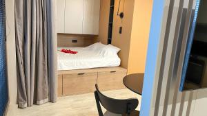 Posteľ alebo postele v izbe v ubytovaní Comfortable 1-room apartment close to the center