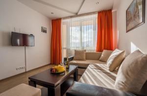 TV a/nebo společenská místnost v ubytování 2-room Apartment NFT Gudauri 303