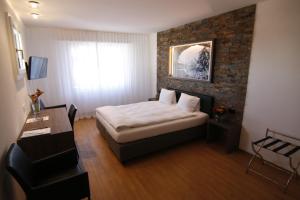 Letto o letti in una camera di Hotel Eremitage