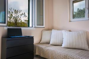 A television and/or entertainment centre at Villa Inspiration