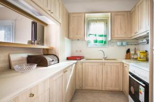 A kitchen or kitchenette at Villa Inspiration