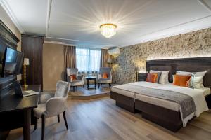 Cama ou camas em um quarto em Villa Westend Hotel an der Messe