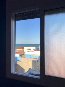 Bazén v ubytování Beach House nebo v jeho okolí