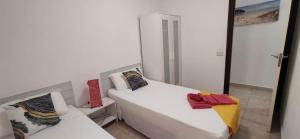 Posteľ alebo postele v izbe v ubytovaní CASA FULVIO FUERTEVENTURA