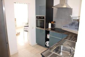 Kuchyňa alebo kuchynka v ubytovaní CASA FULVIO FUERTEVENTURA
