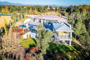 an aerial view of a house with a swimming pool at Luxurious Golf Villa La Vinya 5 in Caldes de Malavella