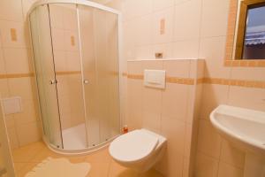 Koupelna v ubytování Apartmány Udatný