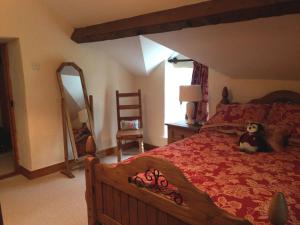 Ένα ή περισσότερα κρεβάτια σε δωμάτιο στο Berwick Hall Cottage