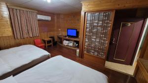 TV o dispositivi per l'intrattenimento presso 四重溪洺泉溫泉旅館