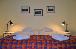 Postel nebo postele na pokoji v ubytování Hotel Utsjoki