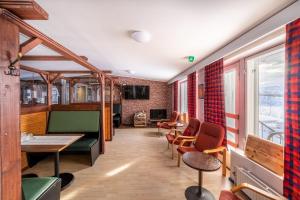 TV a/nebo společenská místnost v ubytování Hotel Utsjoki