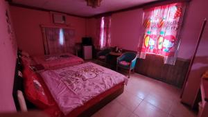 Letto o letti in una camera di 四重溪洺泉溫泉旅館