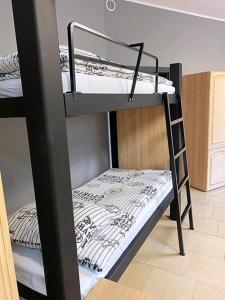Posteľ alebo postele v izbe v ubytovaní Pokoje Duchówka