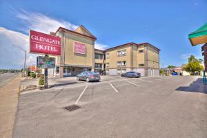 a parking lot in front of a hotel at The Glengate Hotel & Suites in Niagara Falls