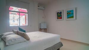 Postel nebo postele na pokoji v ubytování Hotel Boutique Casa Umiña