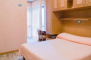Krevet ili kreveti u jedinici u okviru objekta Hotel Terrazzo d'Abruzzo