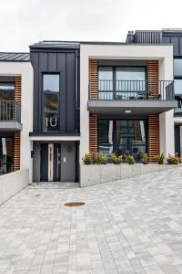 wykonanie domu z podjazdem w obiekcie SKi&bike apartments w Szczyrku