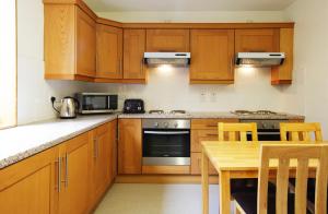 ครัวหรือมุมครัวของ Trinity College - Campus Accommodation