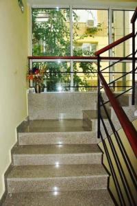 a staircase leading to a building with a window at Venis House in Plovdiv