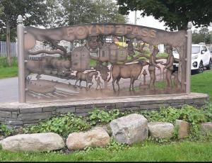 a sign for a park with animals on it at Railway Bar Apartment in Poyntz Pass