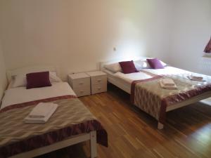 Posteľ alebo postele v izbe v ubytovaní Guest House Wolf