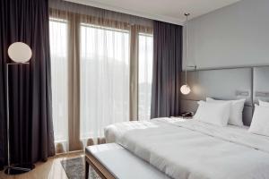 Postel nebo postele na pokoji v ubytování Radisson Blu Hotel Hannover