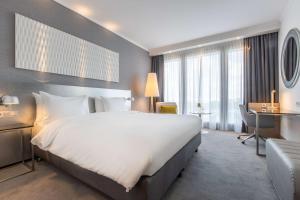 Postel nebo postele na pokoji v ubytování Radisson Blu Hotel Hannover
