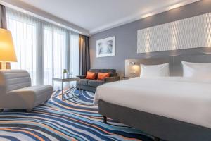 Postel nebo postele na pokoji v ubytování Radisson Blu Hotel Hannover