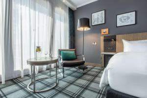 Postel nebo postele na pokoji v ubytování Radisson Blu Hotel Hannover