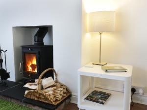 
a living room with a fire place and a fireplace at 21 Wellington Road, Beverley in Beverley
