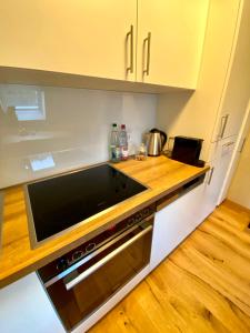 Küche/Küchenzeile in der Unterkunft Apartmenthaus am Dom mit Parkplatz