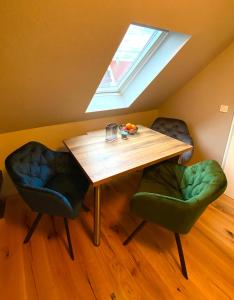 Ein Sitzbereich in der Unterkunft Apartmenthaus am Dom mit Parkplatz