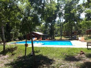 a swimming pool in the middle of a yard at La Quinta Hotel in Eldorado